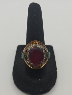Sterling Silver Gold Tone Red Stone Cocktail Ring with Green Accents